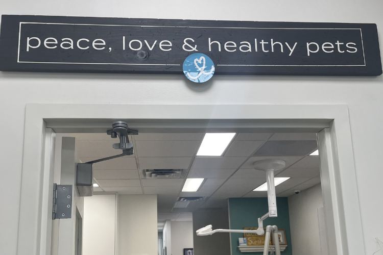 peace-love-and-healthy-pets-signage.png